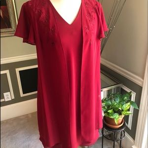 Cocktail or formal dress for Ladies.